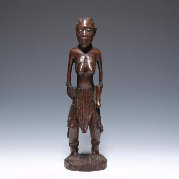 A Carved Mother and Child Statue - Africa 20th. C.